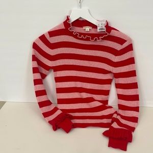 J.Crew. Girls ribbed turtleneck sweater with a little something extra: ruffles!